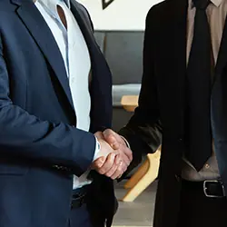 Two business man doing a handshake